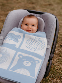 Couverture bébé bleu pastel en laine mérinos motif animaux